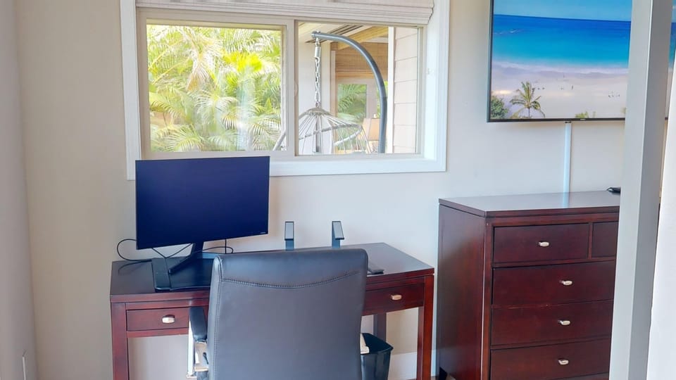 Dedicated workspaces in Primary Suite and kitchen with monitors.