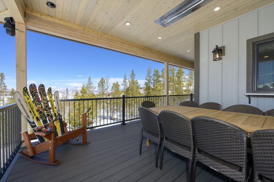 Large outdoor table with seating for 10. Built in outdoor heaters make this space comfortable year round!