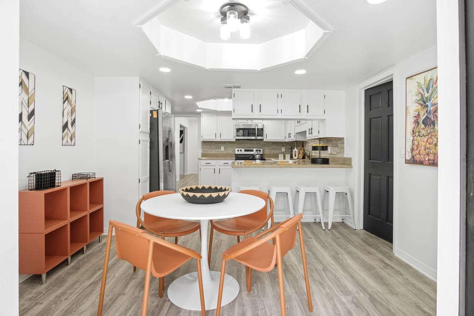 Modern dining room with a bright and functional kitchen