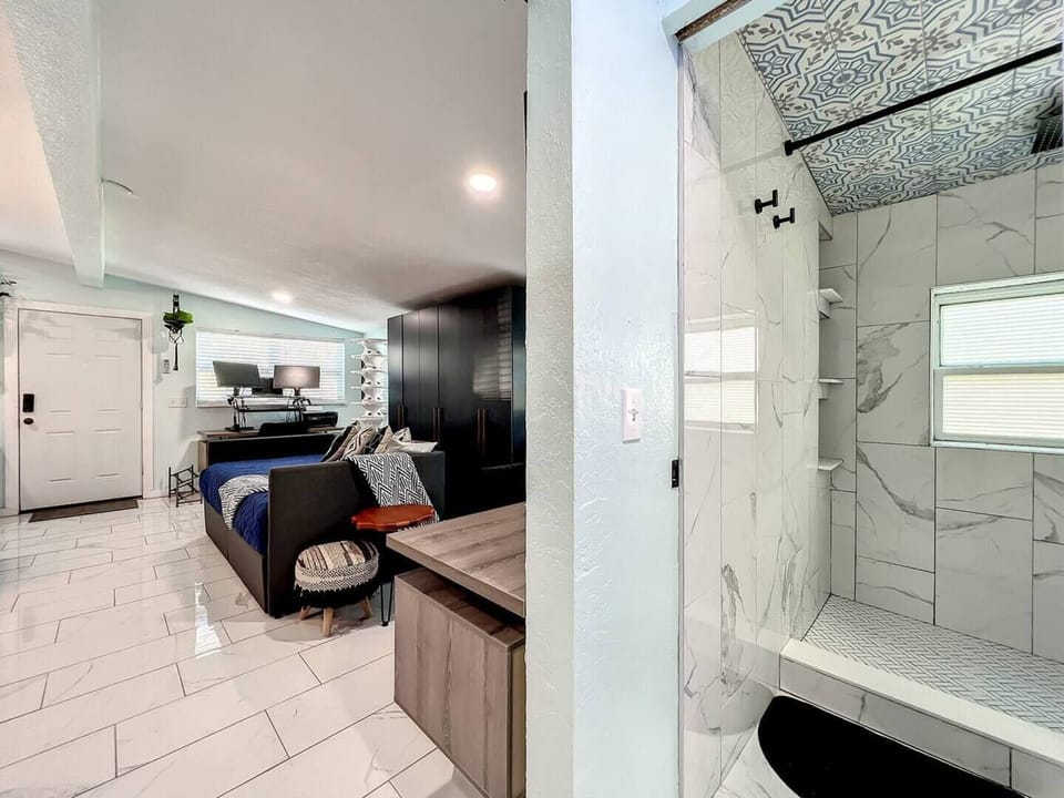Bathroom on the right, and studio on the left.