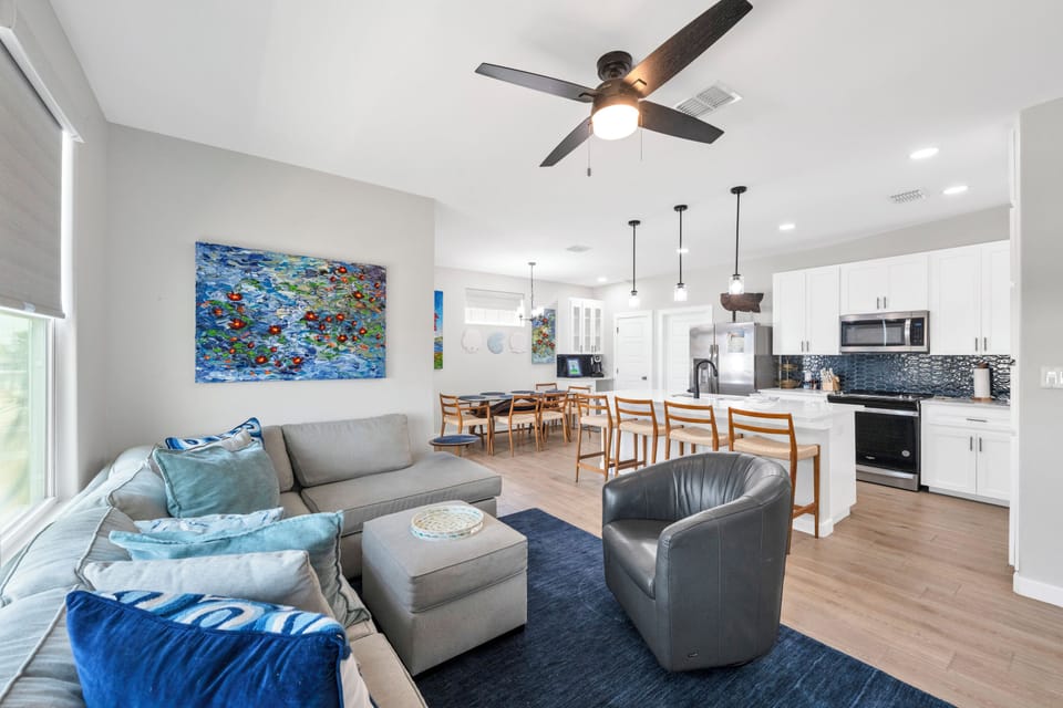 Bright and stylish open floor plan blending the kitchen and living space seamlessly.