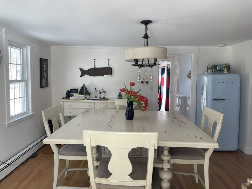 Dining table is adjacent to the kitchen 

