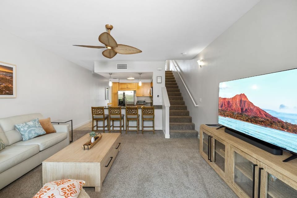 Open space concept living area with A/C & fan