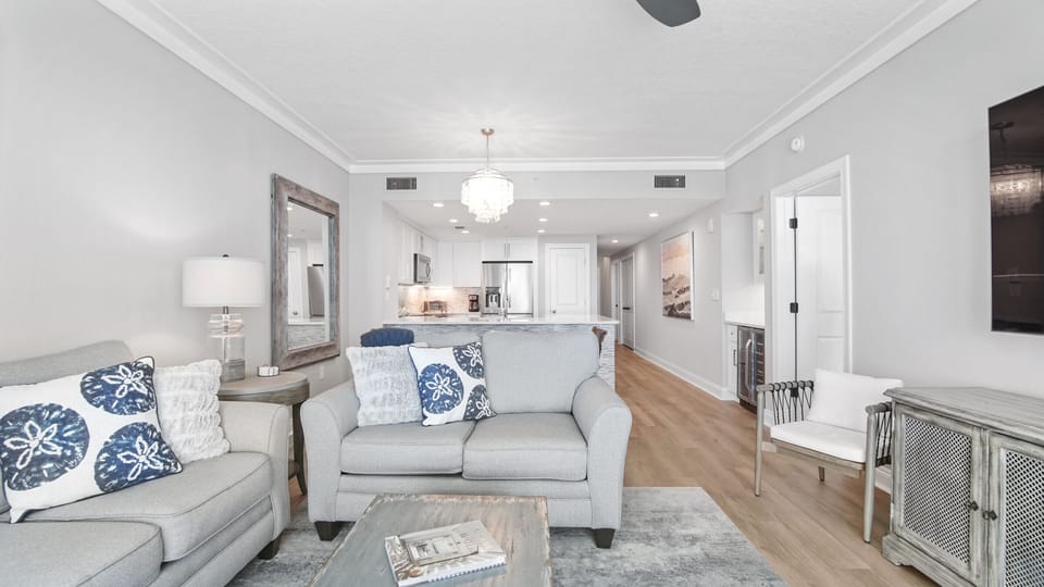 Open living area with dining and kitchen.