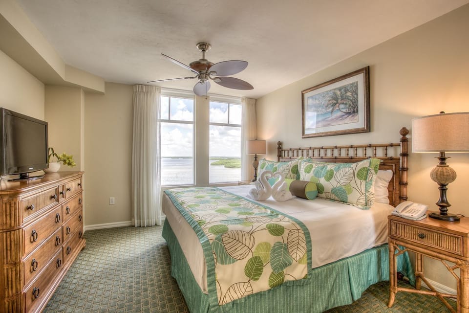 Linger in bed while the water view becomes your backdrop.