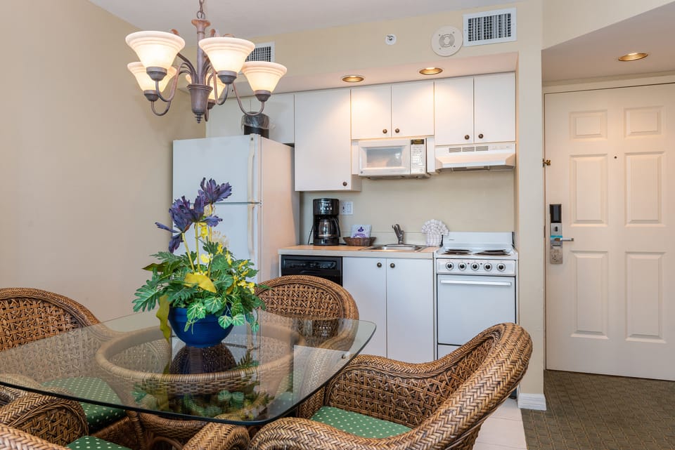 Enjoy easy meals with a bright kitchenette and cozy dining.