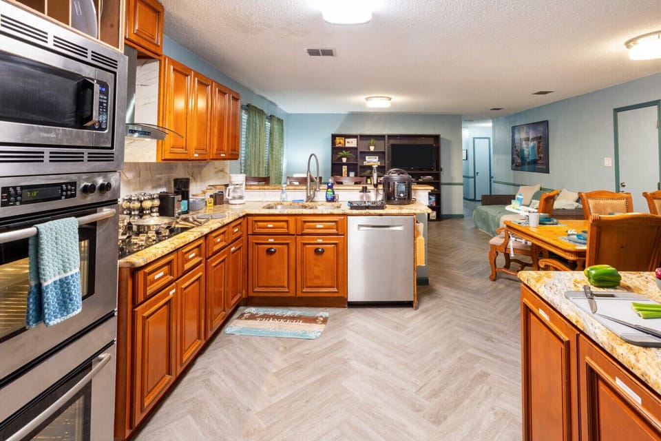 Seamless indoor-outdoor flow keeps everyone connected. Cook-play-relax.