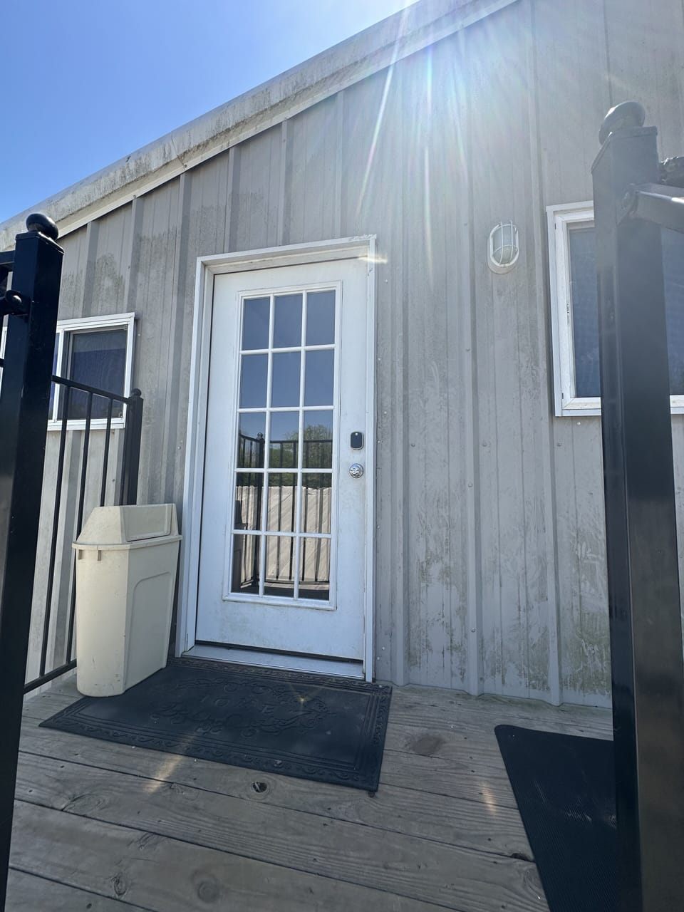 Liberty apartment door entry with a deck