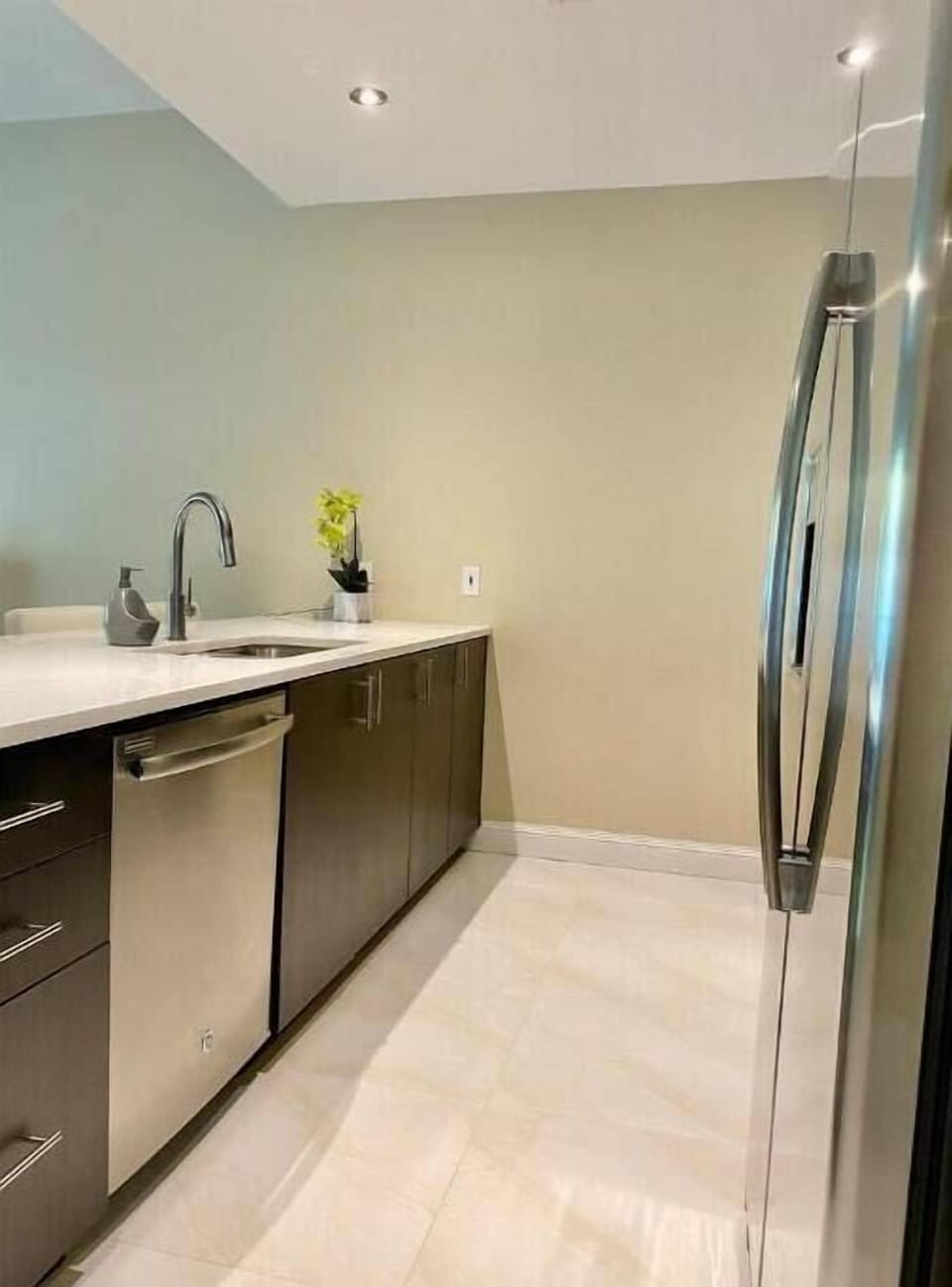 Fully stocked kitchen with modern appliances & coffee makers