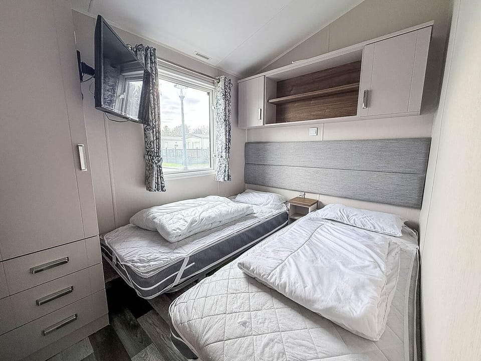 Enjoy a relaxing staycation with your loved ones at Broadland Sands, offering family caravan holidays complete with modern amenities, including cosy bathrooms in a caravan.