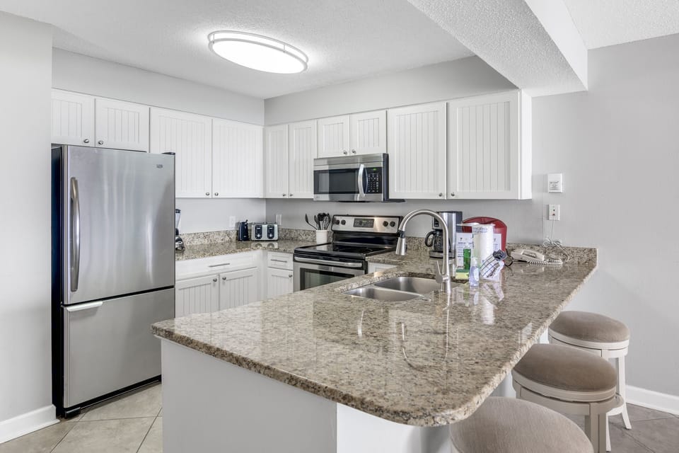 Full kitchen with stainless appliances