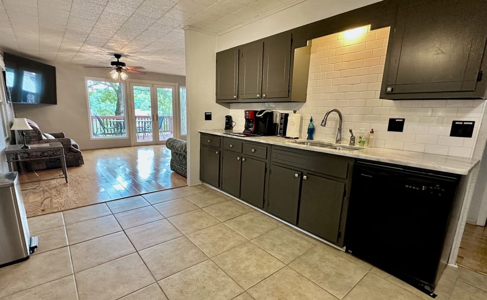Spacious kitchen w/ easy access to open living &  dining rooms