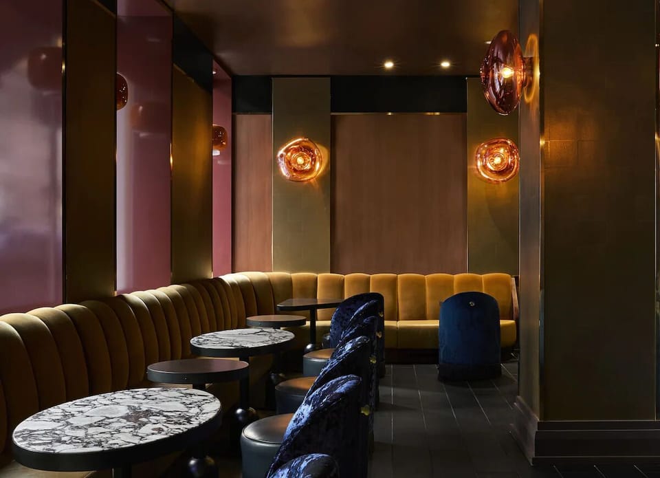 Sip something special in a chic, velvet-lined cocktail nook.