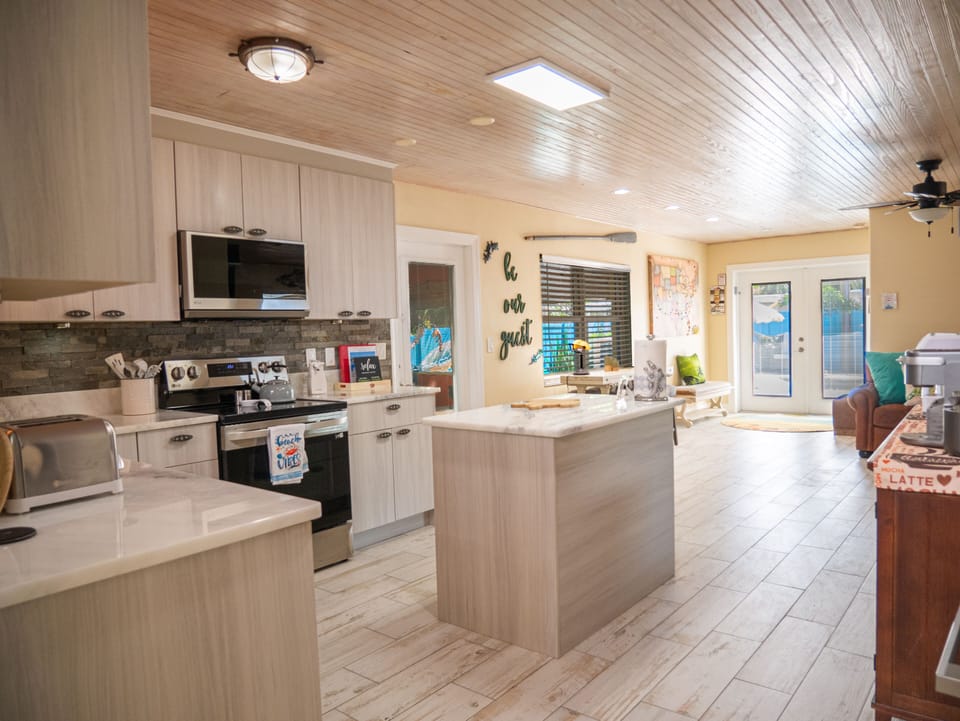 Updated kitchen off game room with Island.  Open concept throughout.