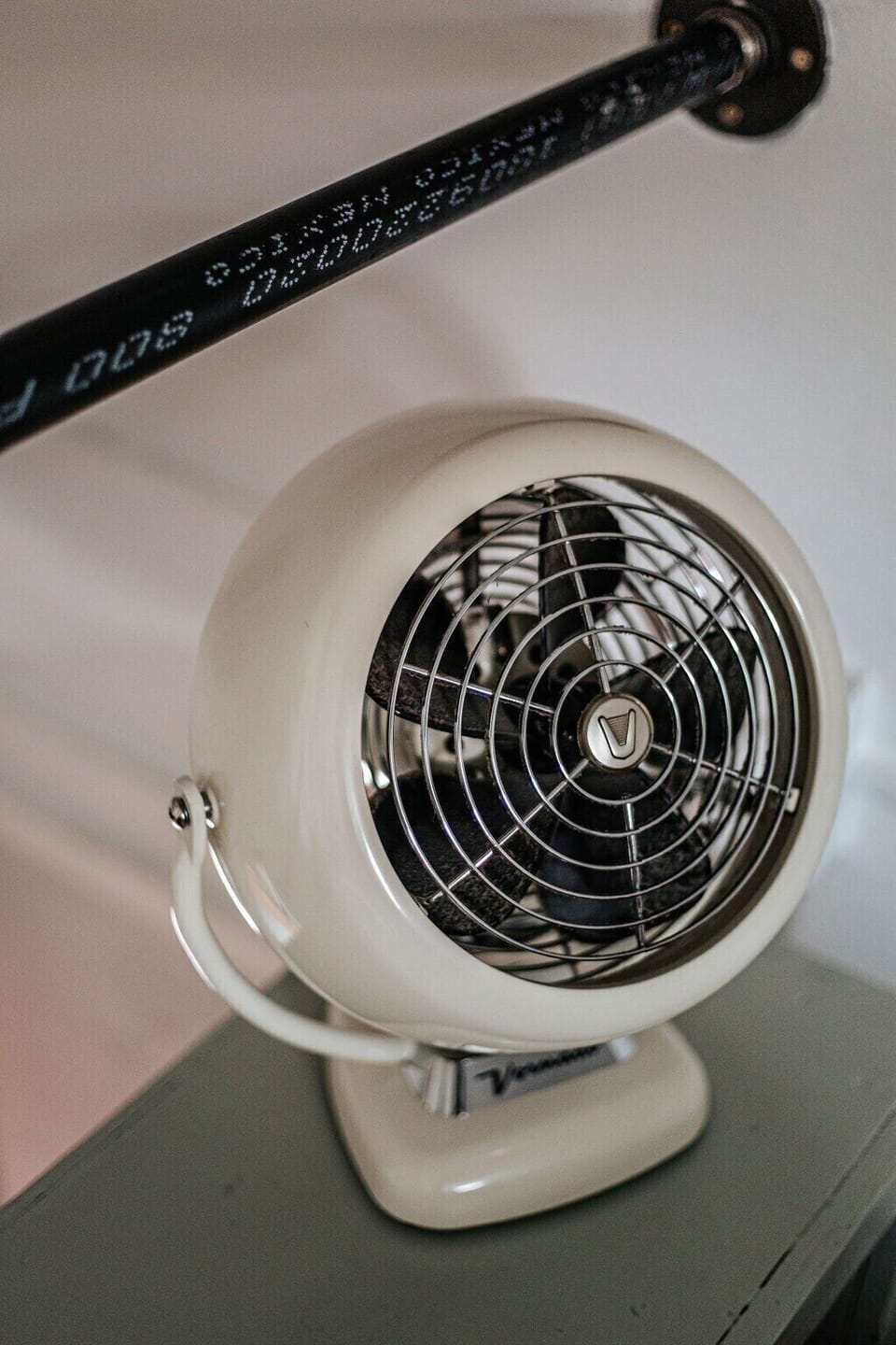 There is one vent for forced air upstairs, but it can get warm! We provide a fan for extra air flow.