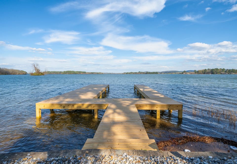 Start your mornings with coffee at the end of the dock while the calm lake stretches out in every direction and the breeze rolls across the water.