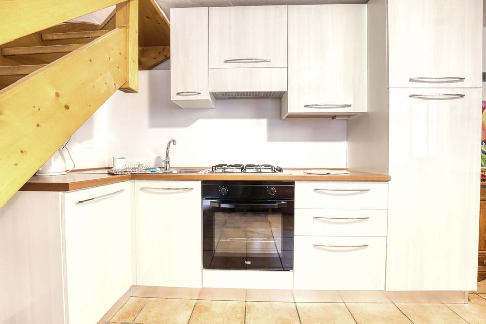 Cabinetry, Countertop, Furniture, Kitchen, Kitchen Stove, Wood, Drawer, Building, Interior Design, Flooring