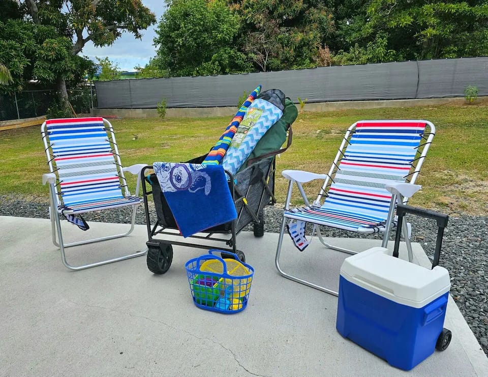 Beach chairs, wagon, cooler and toys included