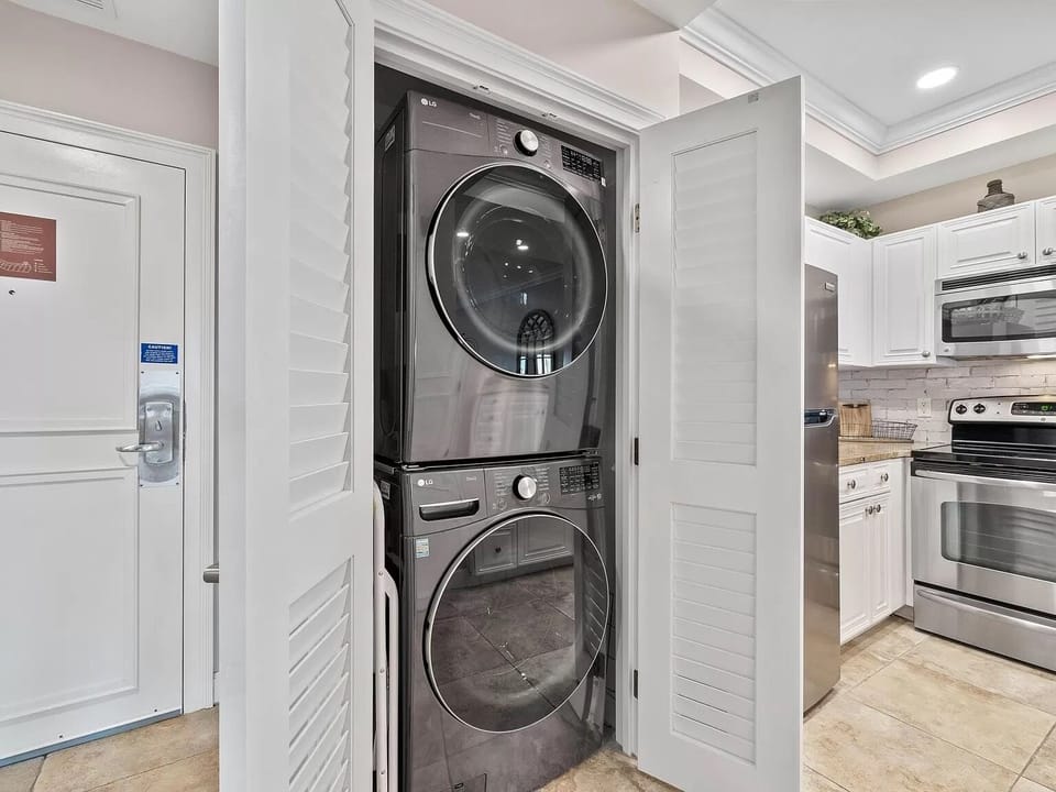 full sized washer and dryer in kitchen closet.