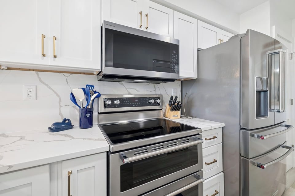 Fully Equipped Kitchen Offering Stainless Steel Appliances