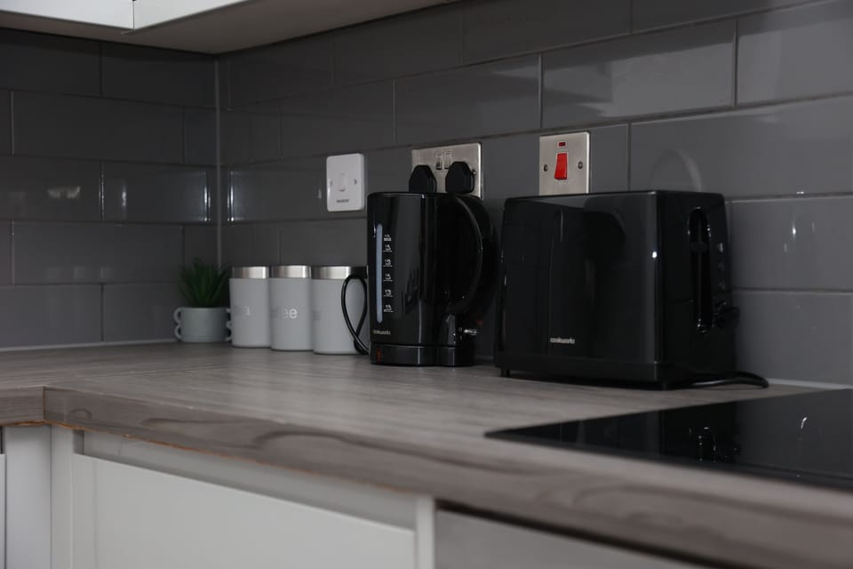 Tea, coffee, sugar. Kettle, toaster and microwave included in your stay.
