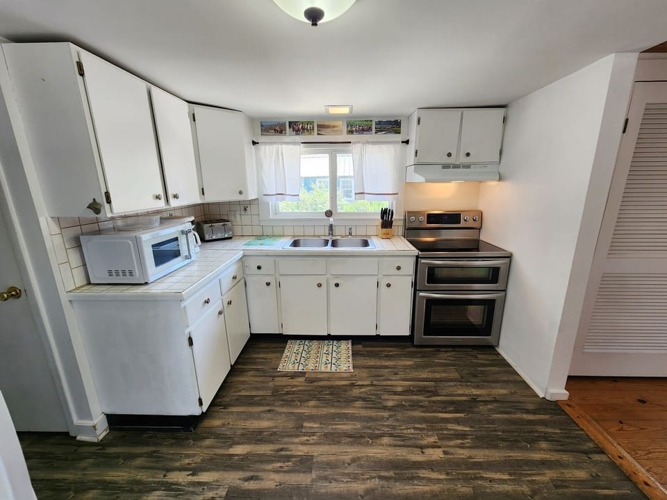 Warm and inviting kitchen with all the essentials for easy meal prep