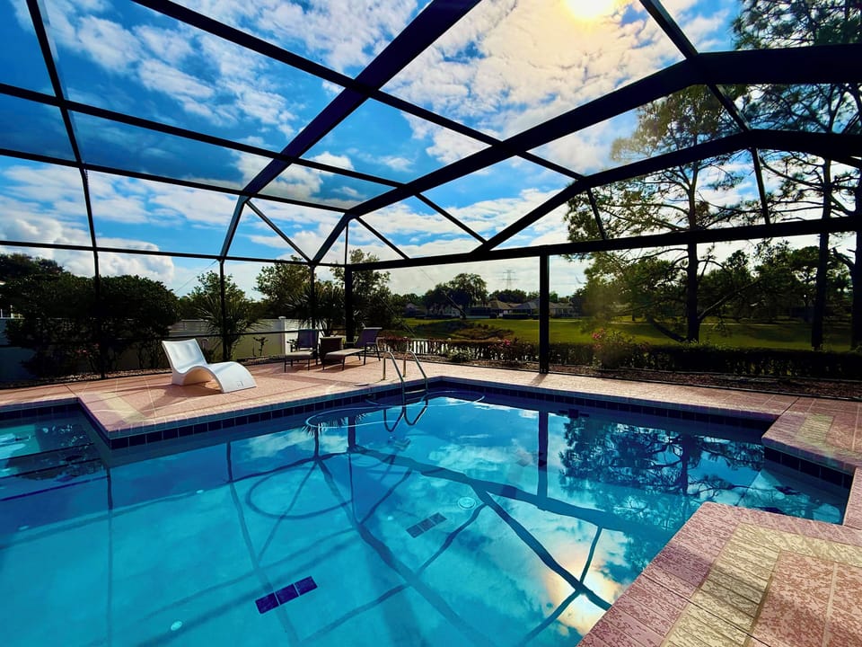 Huge pool with view of the championship golf course and bird pond