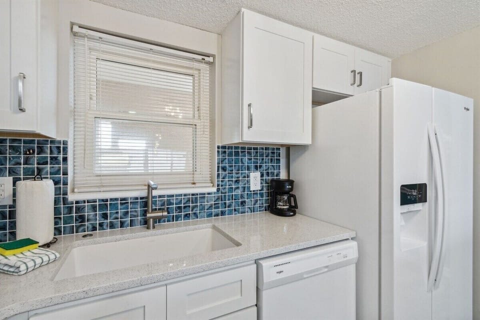 Kitchen is Equipped with Drip Coffee Maker