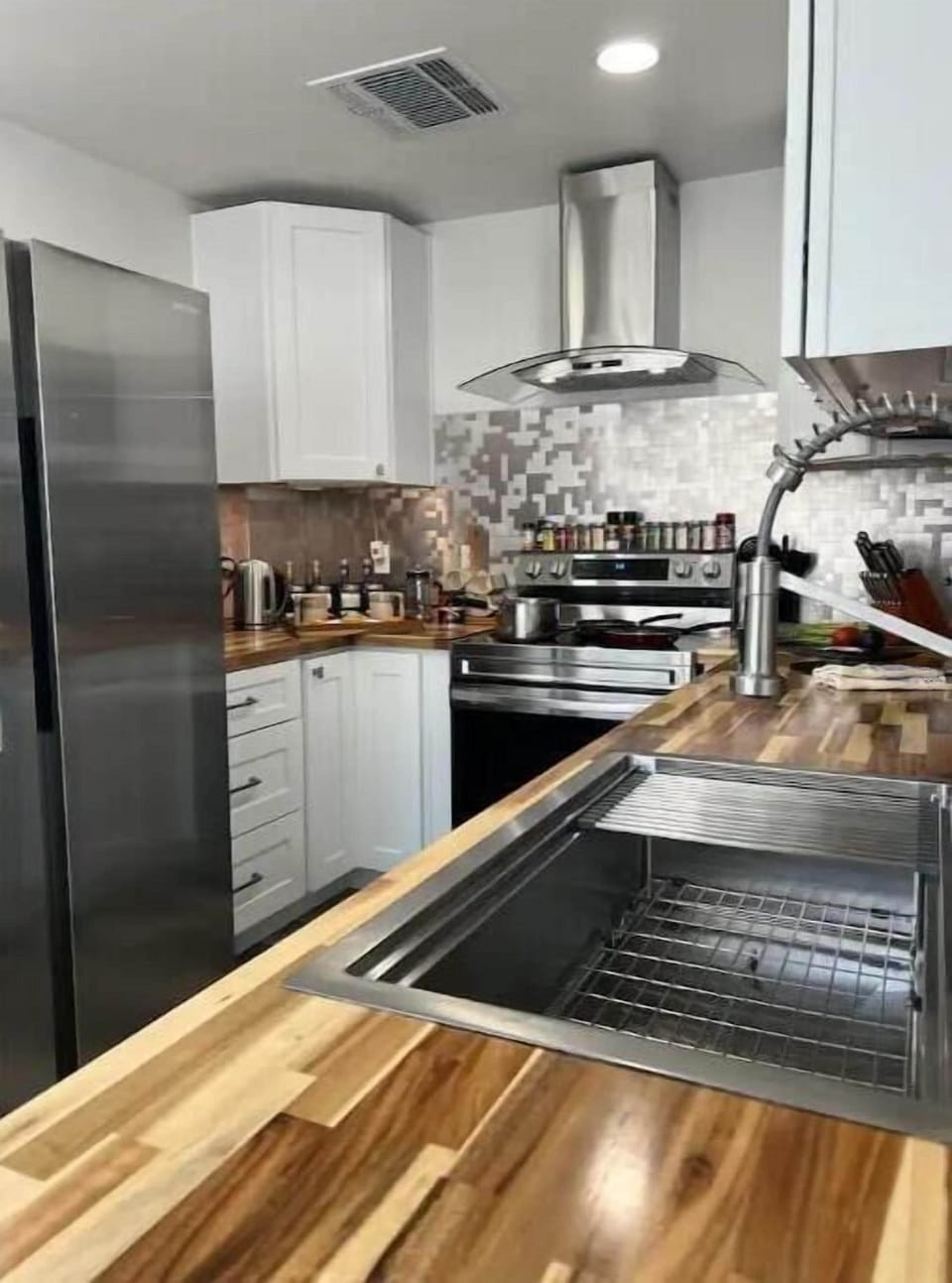 Full kitchen with coffee/tea bar for those nights you stay in.