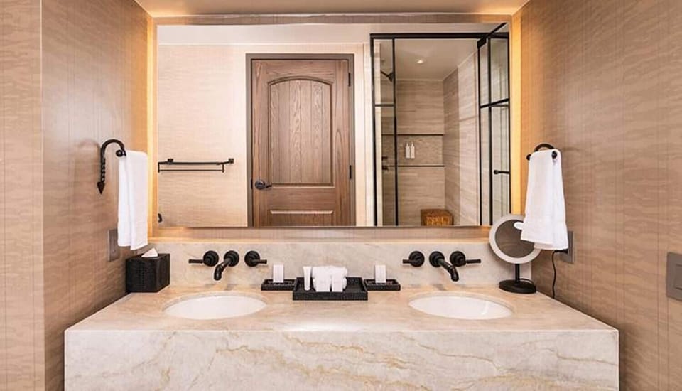 Get ready together with a bright double vanity and mirrors.
