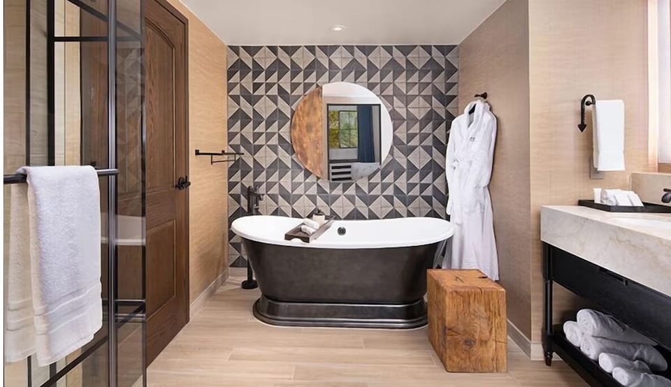 Soak and reset in a spa-inspired bath with deep tub.