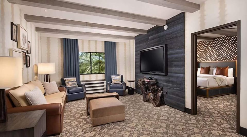 Stretch out in a spacious lounge with seating and big TV.