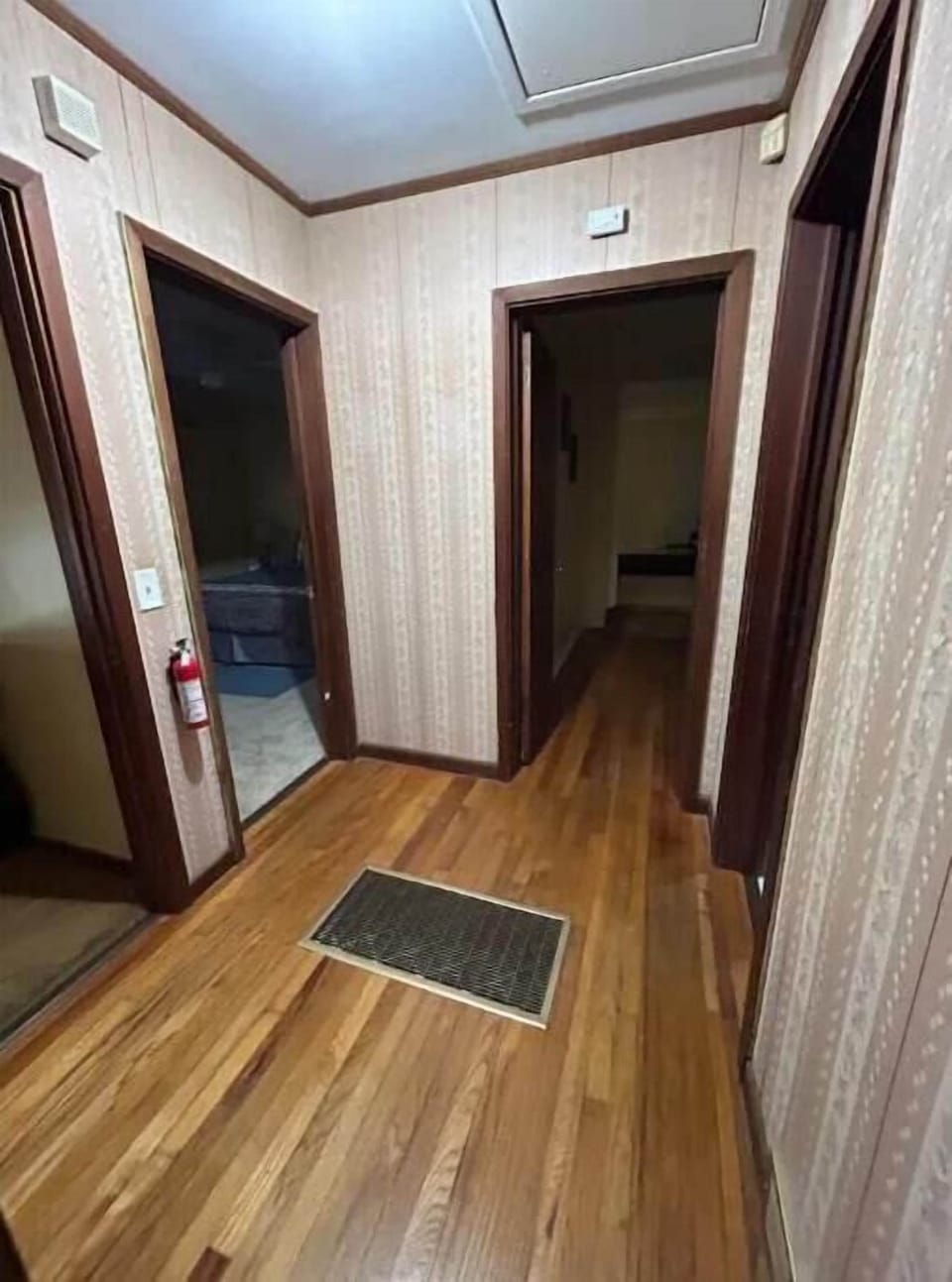 Hallway with fire extinguisher.