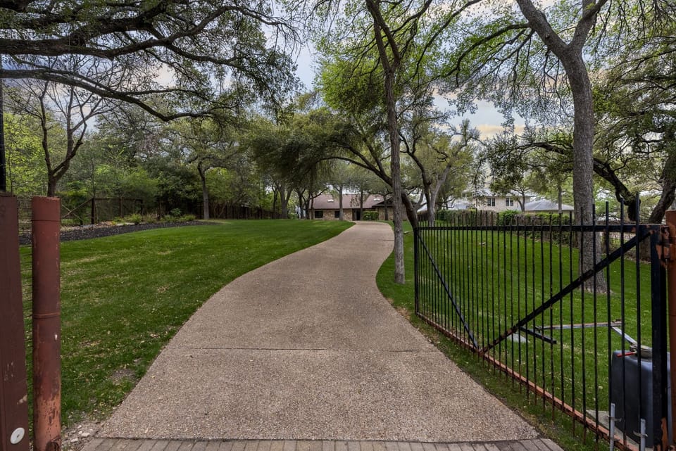 Pathway to home and spacious front yard
