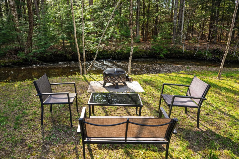 Enjoy an evening by the brook with a fire; wood is provided