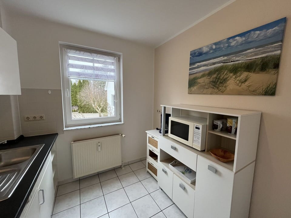 Property, Cabinetry, Window, Kitchen Sink, Sink, Interior Design, Drawer, Wood, Floor, Shelving