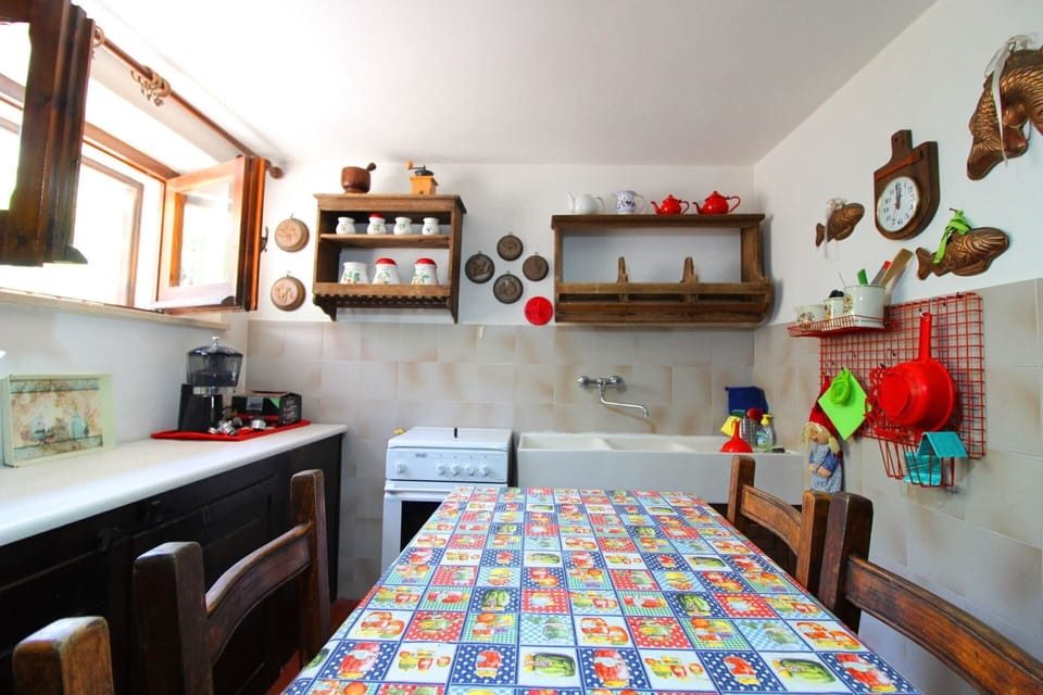 Picture Frame, Property, Cabinetry, Furniture, Orange, Interior Design, Wood, Lighting, Architecture, Drawer