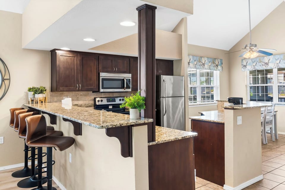 Fully Equipped Kitchen with Extra Bar Seating