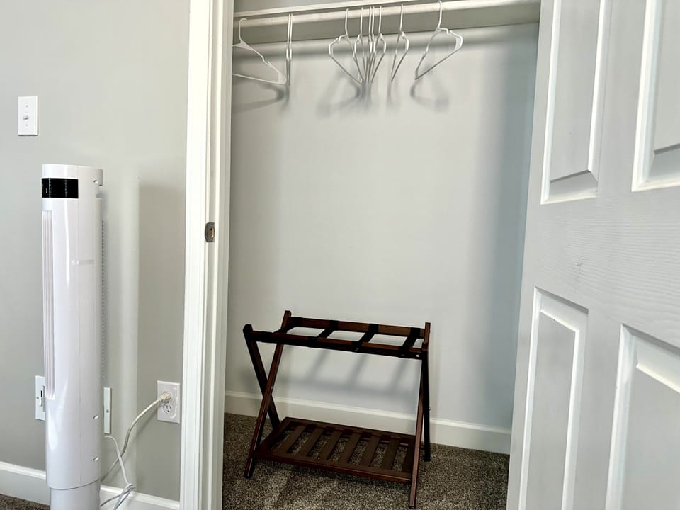 walk-in closet and luggage rack available for both bedrooms