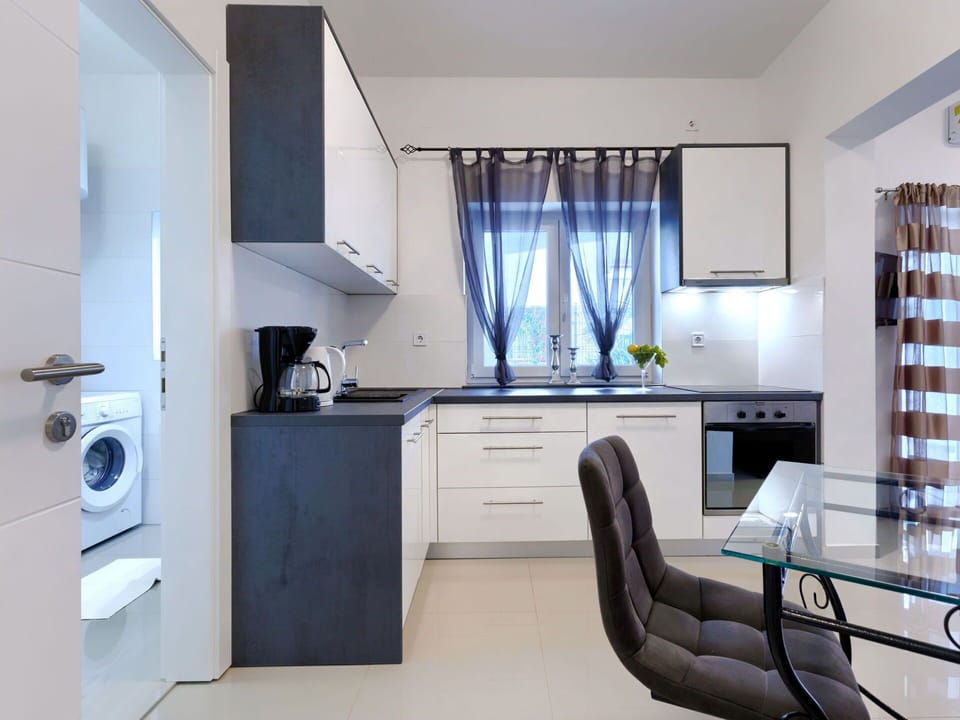 Cabinetry, Furniture, Property, Countertop, Azure, Kitchen, Purple, Interior Design, Flooring, Floor