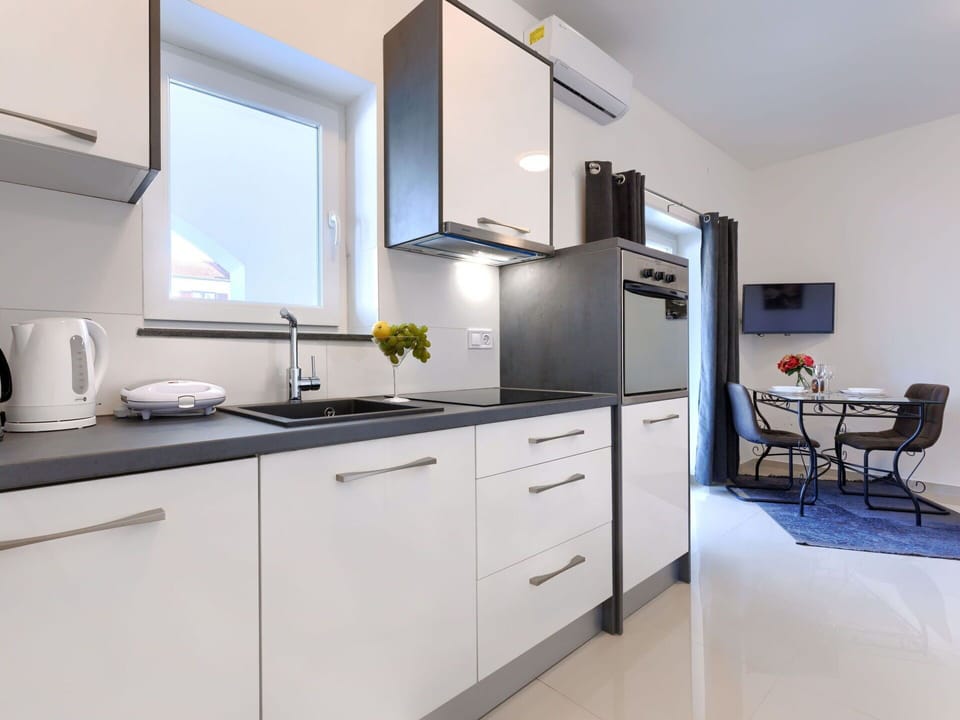 Cabinetry, Countertop, Furniture, Kitchen Sink, Sink, Building, Kitchen, Kitchen Stove, Tap, Lighting