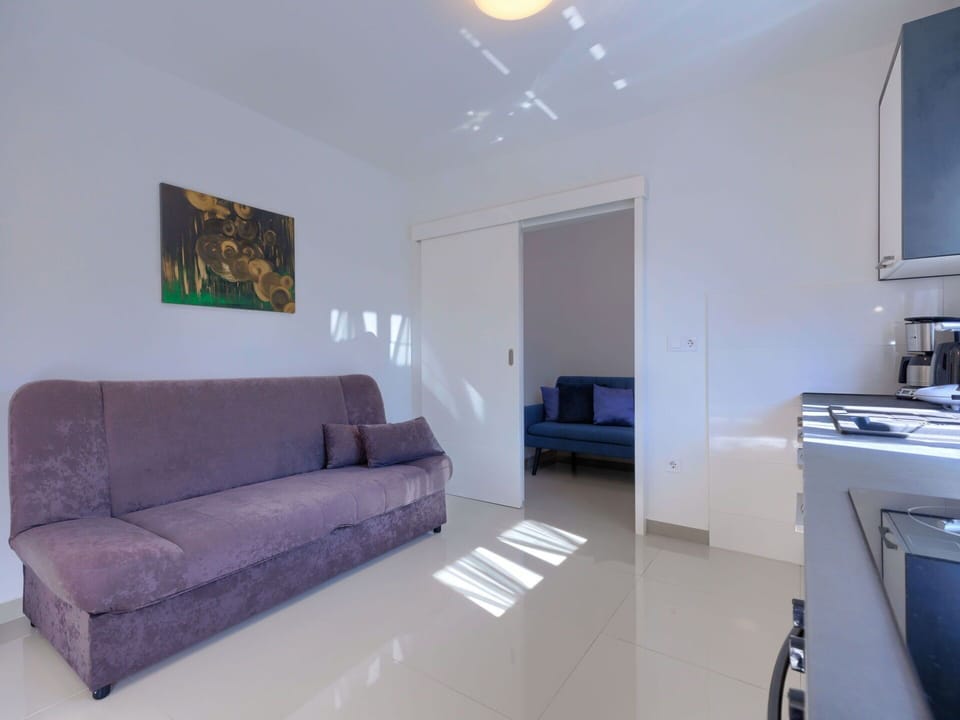 Couch, Furniture, Property, Comfort, Interior Design, Lighting, Wood, Floor, Building