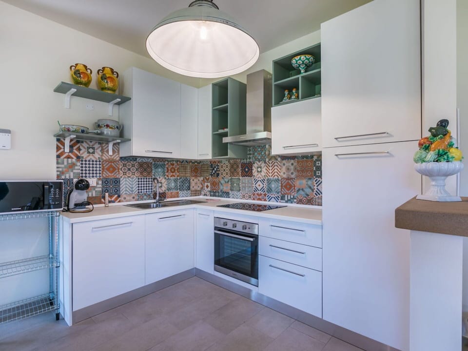 Cabinetry, Countertop, Kitchen Stove, Kitchen Appliance, Lighting, Kitchen, Wood, Home Appliance, Interior Design, Stove