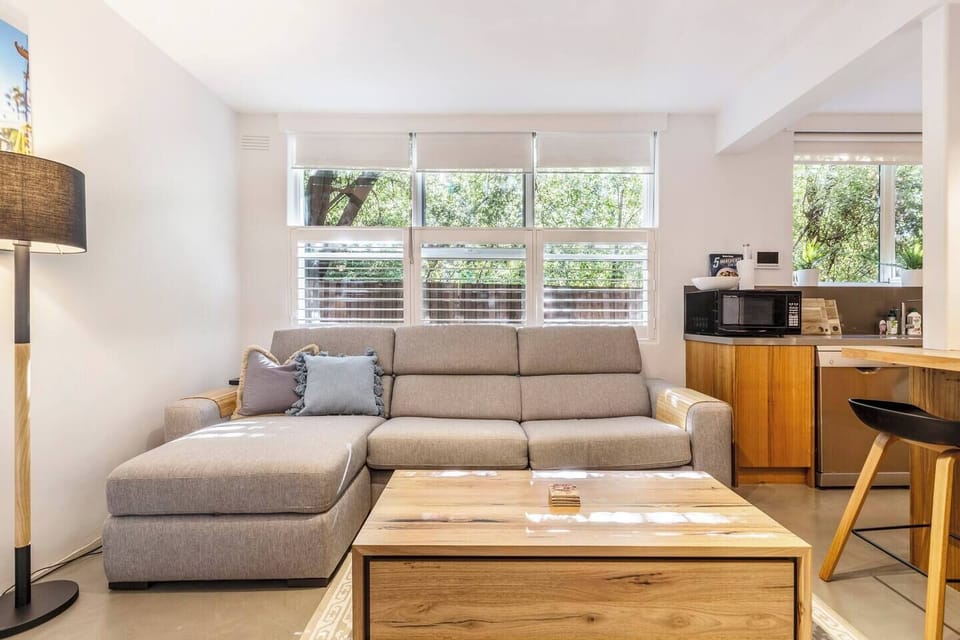 An L-shaped sofa in the living room makes it easy to relax and kick your feet up.
