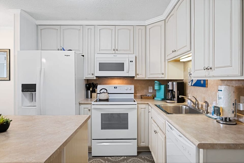 From coffee to cocktails, this fully stocked kitchen has you covered