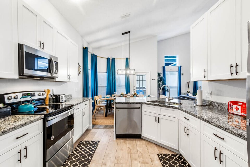 Sleek kitchen setup: Fully stocked and ready for culinary adventures