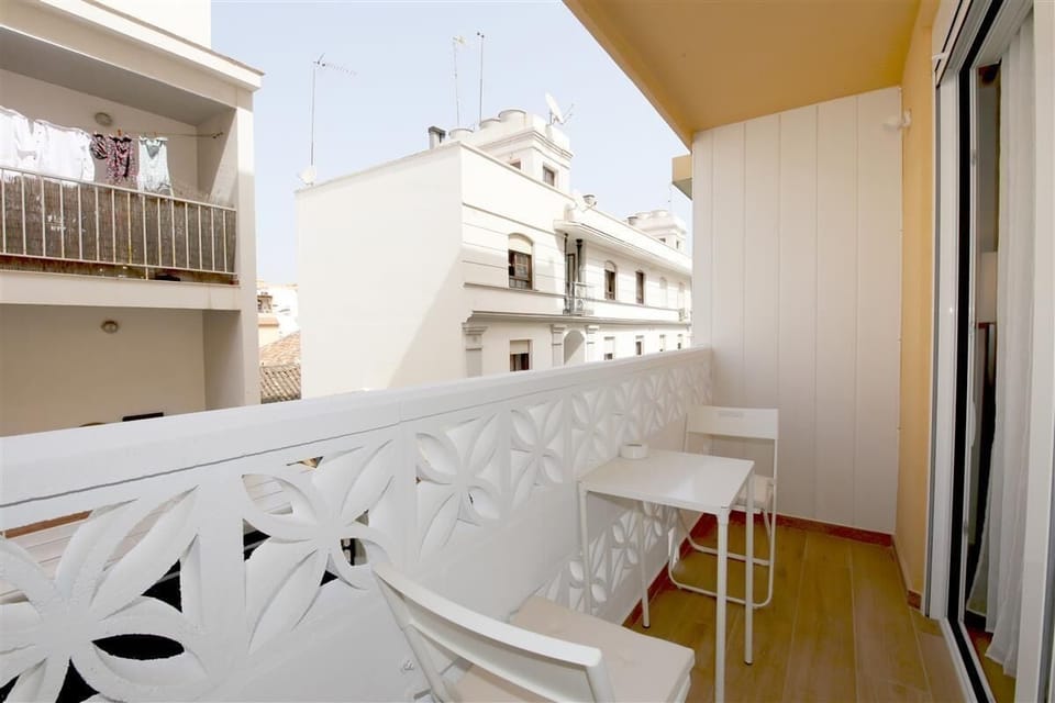 Private balcony with outdoor dining area for two guests