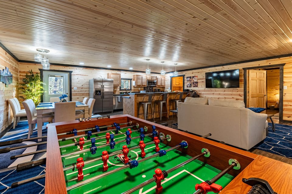 Open concept living space with game area