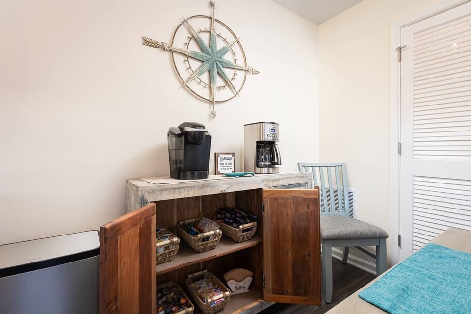 Start your day here with coffee including K-cups, ground coffee, creamer, sugar, tea bags, and hot cocoa.
