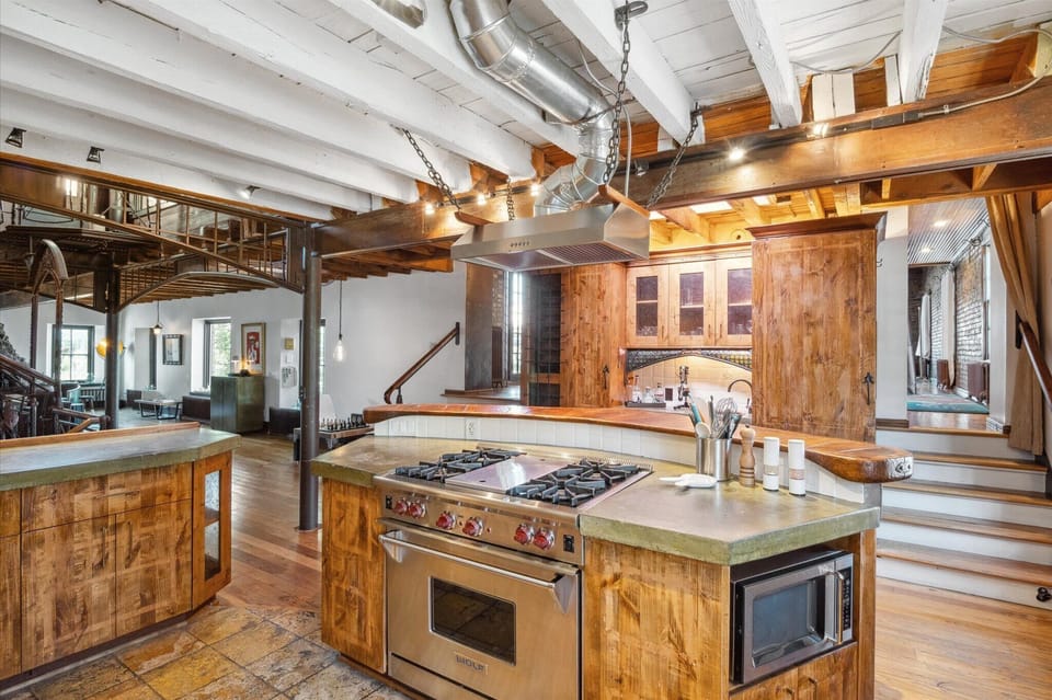 Kitchen stocked with high-end cookware to make gourmet meals. 